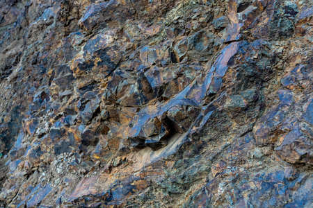 Geological formation with lava colums after magma eruption from stratovolcano close up