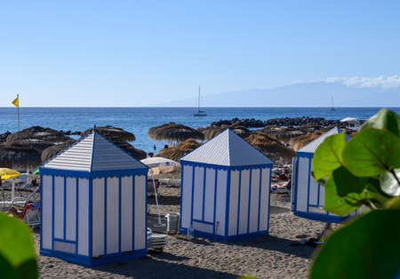 All year sun travel destination in Europe, blue ocean water on beach Playa del Duque in Costa Adeje, Tenerife island, Canary, Spainの写真素材
