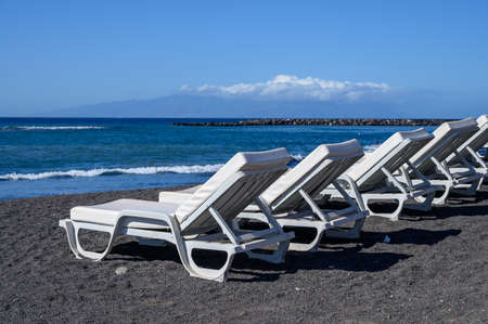 All year sun travel destination in Europe, blue ocean water on beach Playa del Duque in Costa Adeje, Tenerife island, Canary, Spainの写真素材