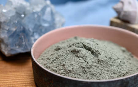 Healthy mud for body and hair treatment ingredient, natural organic blue clay powder ready to use close upの写真素材