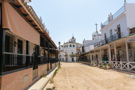 September 9, 2019, El Rocio, Andalusia, Spain. Small old town in Donana national park with sandy roads and squares, horse riding and white churchのeditorial素材