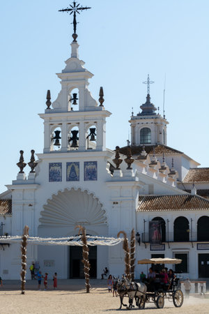 September 9, 2019, El Rocio, Andalusia, Spain. Small old town in Donana national park with sandy roads and squares, horse riding and white churchのeditorial素材