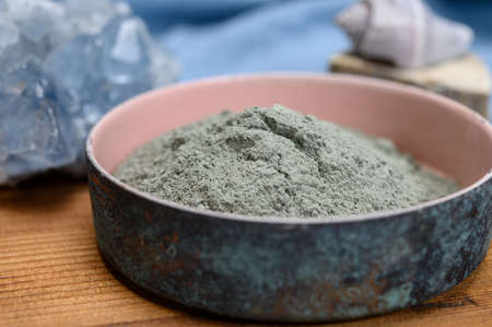 Healthy mud for body and hair treatment ingredient, natural organic blue clay powder ready to use close upの写真素材