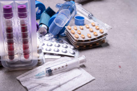 Medical test-tubes with blood samples for screening of virus, flu or bacterial infections and...