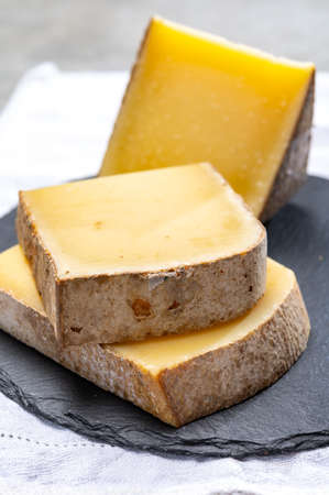 French cheese Comte, three varieties 1 year matured Prestige, fruity flavoured Fruite and Vieille...