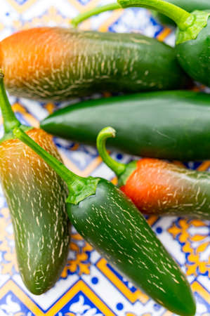 Fresh hot green mexican jalapeno peppers close upの写真素材