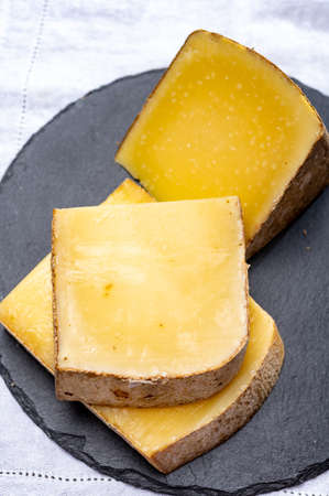 French cheese Comte, three varieties 1 year matured Prestige, fruity flavoured Fruite and Vieille...