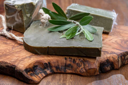 Green blocks of handmade bio vegetal natural olives and bay leaf soap from Provence, Franceの写真素材