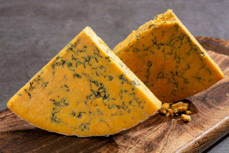 Cheese collection, English shropshire blue waxed cheese close upの写真素材