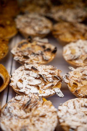 Traditional dessert pastry in Portugal, pastel de nata eggs cream cakes with almonds