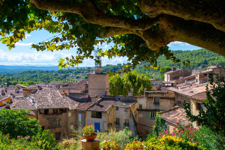 Travel destination, small ancient village Cotignac in Var, Provence, surrounded by vineyards and cliffs with troglodytes houses.の写真素材