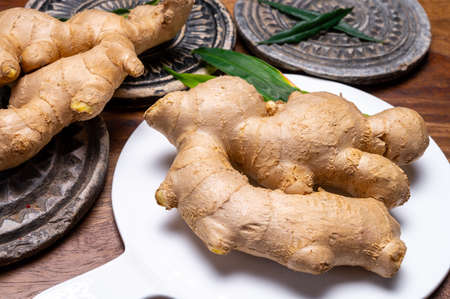 Fresh organic ginger rhizome root used in traditional medicines and for flavoring meals, drinks...