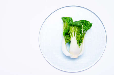 Young organic white bok choy or bak choi Chinese cabbage isolated on white backgoundの写真素材