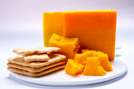 Cheese collection, orange and yellow smoked British cheese from England close upの写真素材