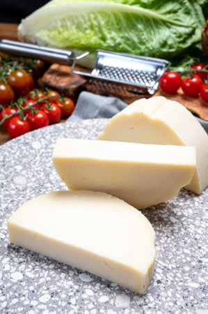 Cheese collection, Italian pasta filata aged cheese provolone from Cremona, Northwest of Italy,...