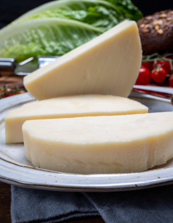 Cheese collection, Italian pasta filata aged cheese provolone from Cremona, Northwest of Italy, close upの写真素材