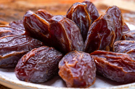 Dried sweet sugar free dates medjoul fruits from Israel close upの写真素材