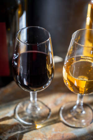 Tasting of Portuguese fortified port wine, produced in Douro Valley, North of Portugal in sunny dayの写真素材