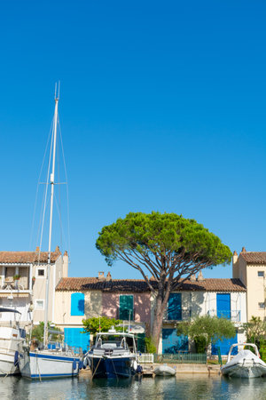 Travel and summer vacation destination, view on houses, roofs, canals and boats in Port Grimaud, Var, Provence, French Riviera, Franceのeditorial素材