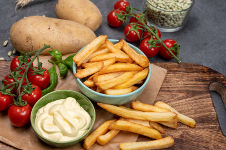 Bown with fresh cooked french fries potato chips with belgian mayonnaise sauce close upの写真素材