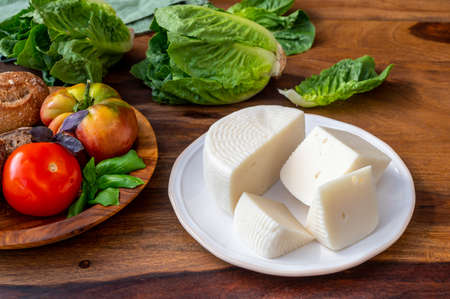 Cheese collection, white Italian sheep cheese pecorino primo sale from Sicily island close upの写真素材