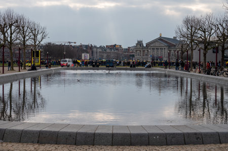 March 7, 2021, Amsterdam, Netherlands, Yellow umbrella's protest against covid-19 measures of Dutch government and vaccinationのeditorial素材