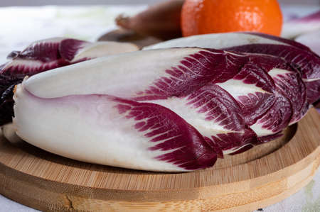 Healthy food, fresh Belgian endive red chicory lof lettuce close upの写真素材