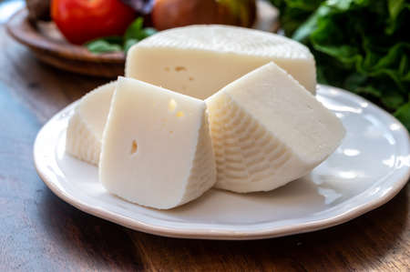 Cheese collection, white Italian sheep cheese pecorino primo sale from Sicily island close up