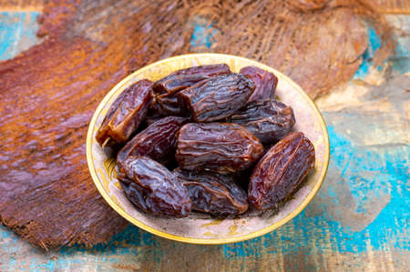 Dried sweet sugar free dates medjoul fruits from Israel close up