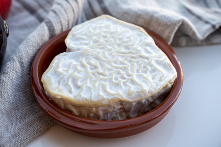 Cheese collection, French cheese from Normandy region, heart-shaped neufchatel close up