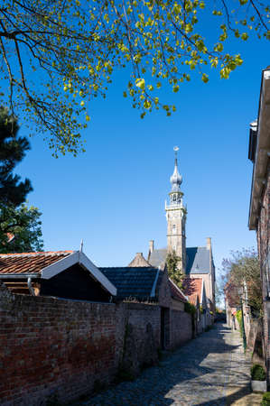 City view on old medieval houses in small historical town Veere in Netherlands, Walcheren, province of Zeelandの写真素材