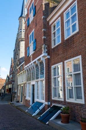 City view on old medieval houses in small historical town Veere in Netherlands, Walcheren, province of Zeelandの写真素材