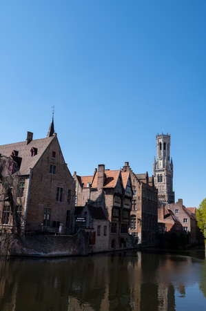 27 April 2021, Bruges, Belgium, walking on medieval Bruges streets in historical city center in sunny day, travel destinationの写真素材