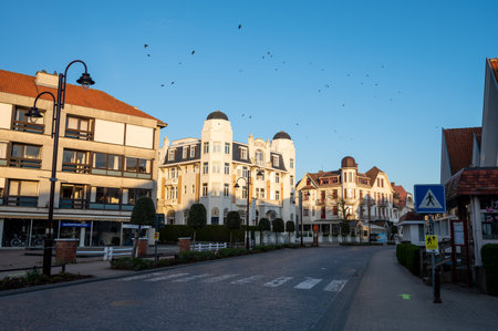 April 25, 2021 De Haan or La Coq sur mer, Belgium, old belle epoque town in West Flanders on North Sea coast, luxury travel destination in sunny dayのeditorial素材