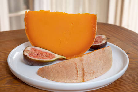 Cheese collection, French yellow cheese mimolette made from cow milkの写真素材