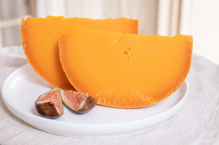 Cheese collection, French yellow cheese mimolette made from cow milkの写真素材