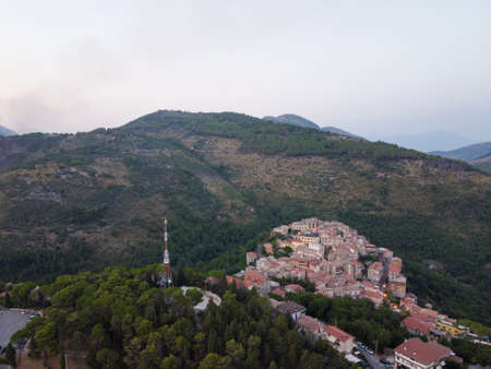 Small mountain village Lenola, aerial view at sunrise, located near Fondi, Latina, Italyの写真素材