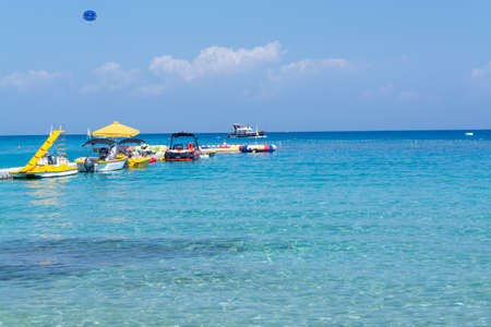 Crystal clear blue water of Mediterranean sea on white sandy Fig tree beach in Protaras, Cyprusのeditorial素材