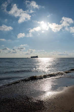 Panoramic view on white sandy beach, dunes and water of North sea between Vlissingen and Domburg, Zeeland, Netherlandsの写真素材