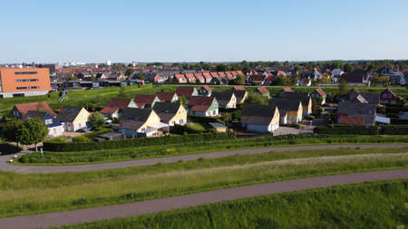 View on houses in Wemeldinge, Zeeland, Netherlands in sunny dayの写真素材