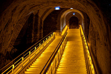 Staircase to deep and long undergrounds caves, making champagne sparkling wine from chardonnay and pinor noir grapes in Reims, Champagne, Franceの写真素材
