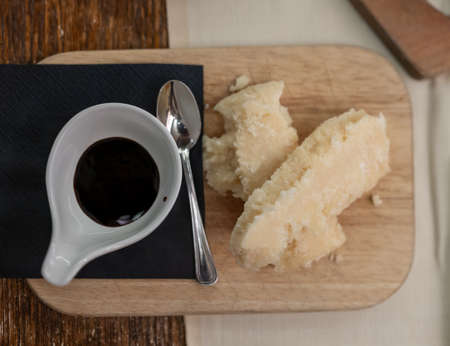 Tasting of different matured and very old parmesan Italian Parmigiano-Reggiano hard cheese and...