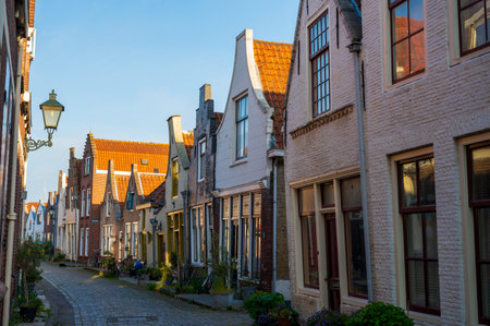 Walking in old Dutch town Zierikzee with old small houses and streets, Zeeland, Netherlandsのeditorial素材
