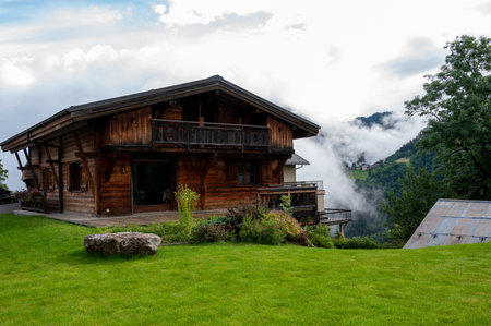 Panoramic view on mountain villages, green forests and apline meadows near Saint-Gervais-les-Bains, Savoy, France in summerのeditorial素材