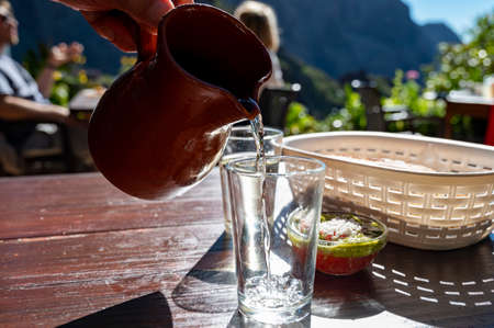 Dinner at guachinche, typical Canary Island establishment on Tenerife, where locally produced white...