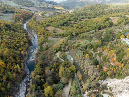 Aerial view on free hot thermal springs and pool in nature park Dei Mulini, Bagno Vignoni, Tuscany, Italy in autumnの写真素材