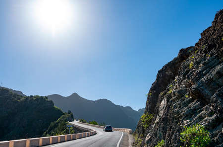 Driving on narrow road in Anaga national park near Tanagana village, North of Tenerife, Canary islands, Spain in winterの写真素材