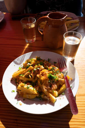 Dinner at guachinche, typical Canary Island establishment on Tenerife, where locally produced white...