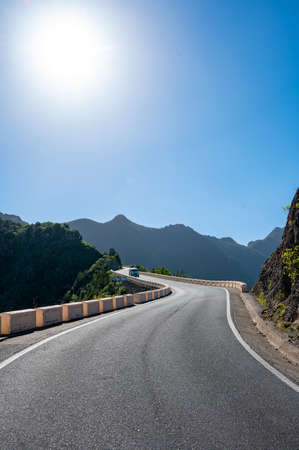 Driving on narrow road in Anaga national park near Tanagana village, North of Tenerife, Canary islands, Spain in winterの写真素材