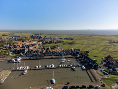 Aerial view on small Dutch town Marken with wooden houses located on former island in North Holland, Netherlands in sunny dayのeditorial素材